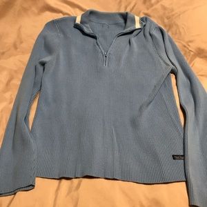 Long sleeve blue Polo sweater.